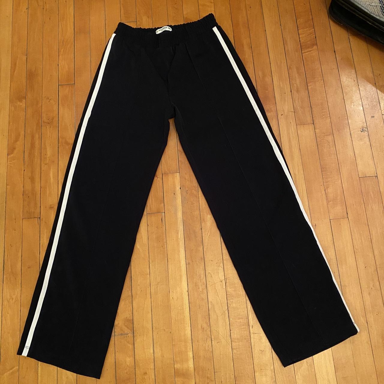 Baggy, navy blue tracksuit pants with white stripes... Depop