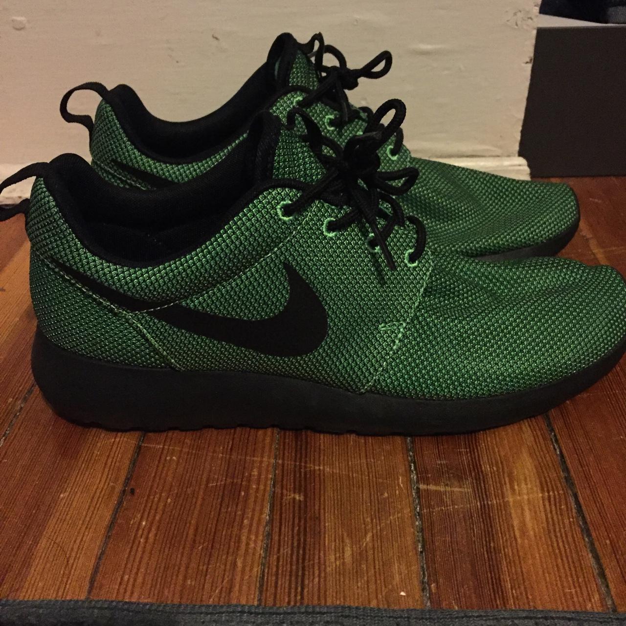 green and black roshe runs