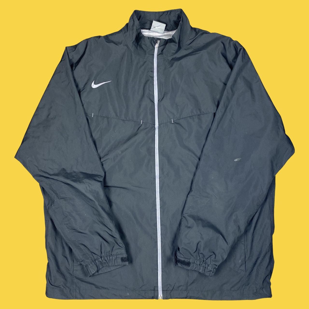 Black Nike windbreaker with grey zip and logo Small... - Depop