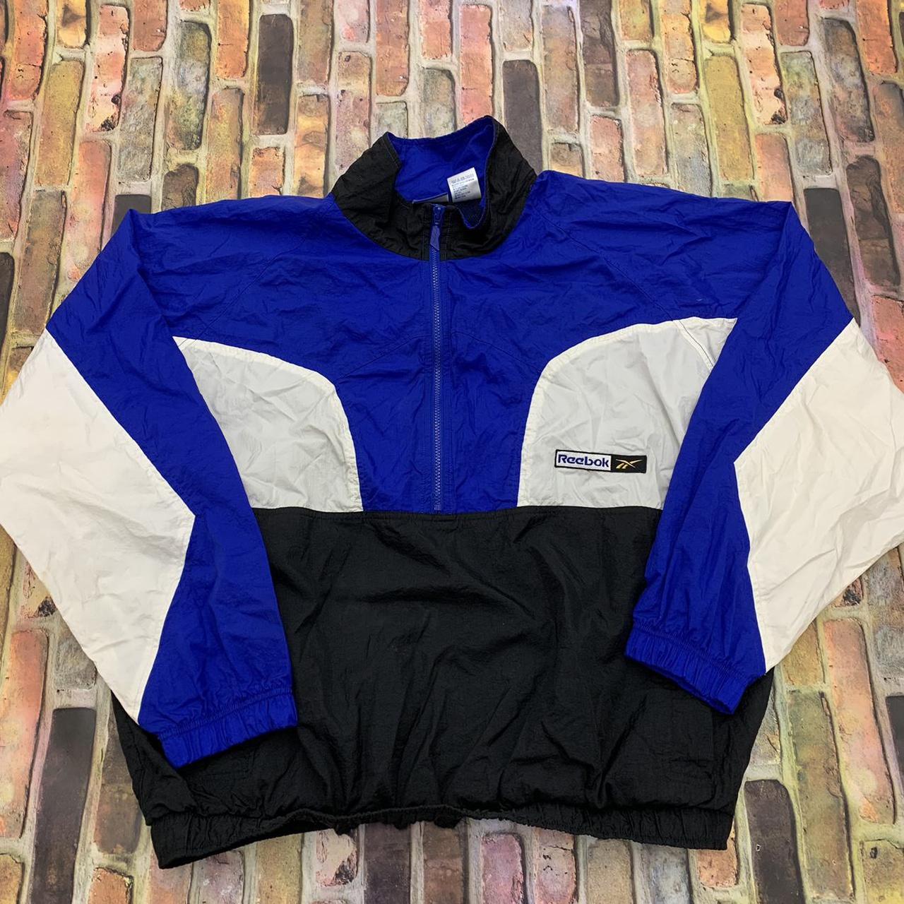 Vintage Reebok windbreaker in blue color block. From... - Depop