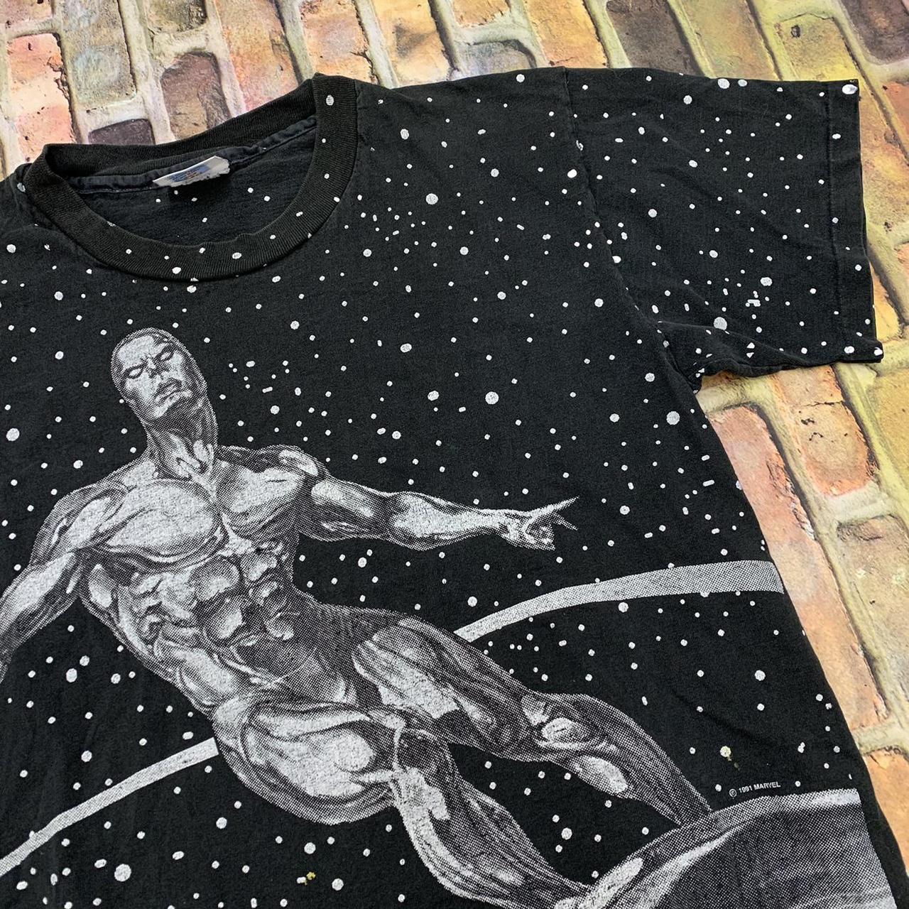 Vintage Marvel Silver Surfer tee in black. From...