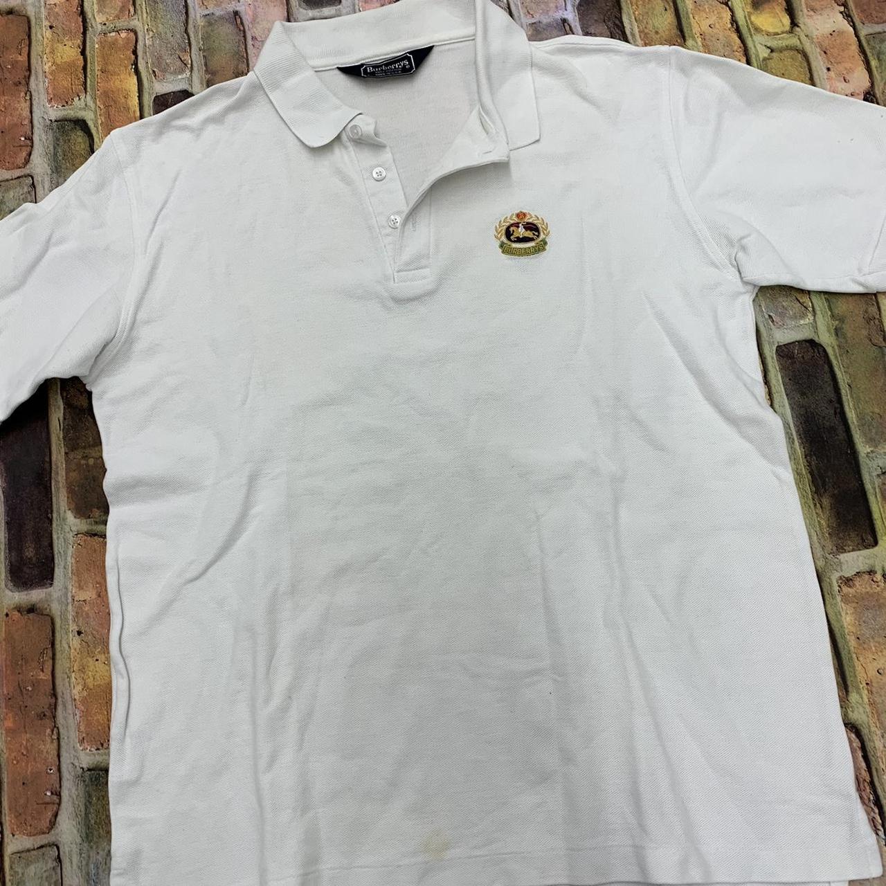 Vintage Burberrys polo shirt in white. From the 80s.... - Depop