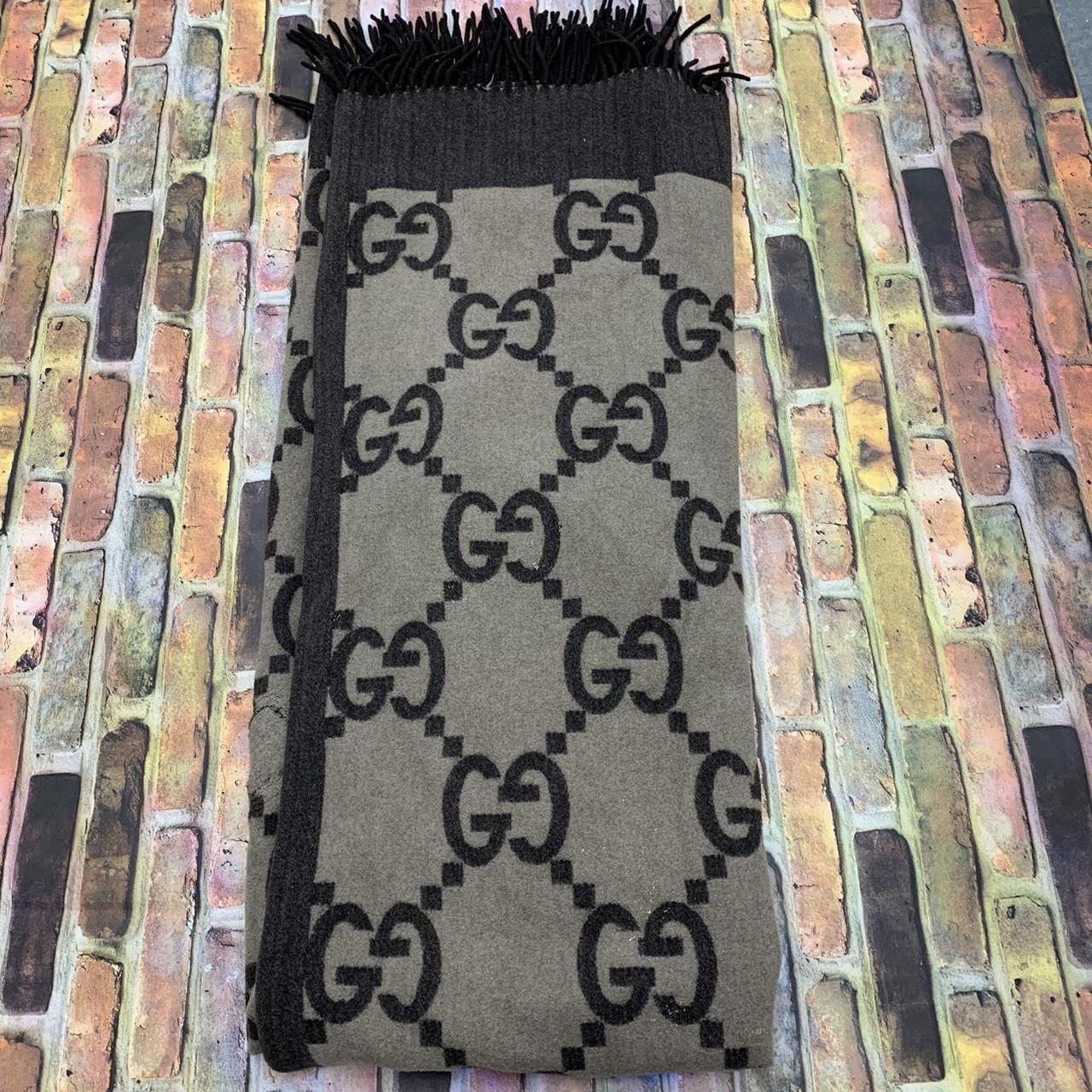 Gucci throw blanket in beige and brown. Shows light... Depop