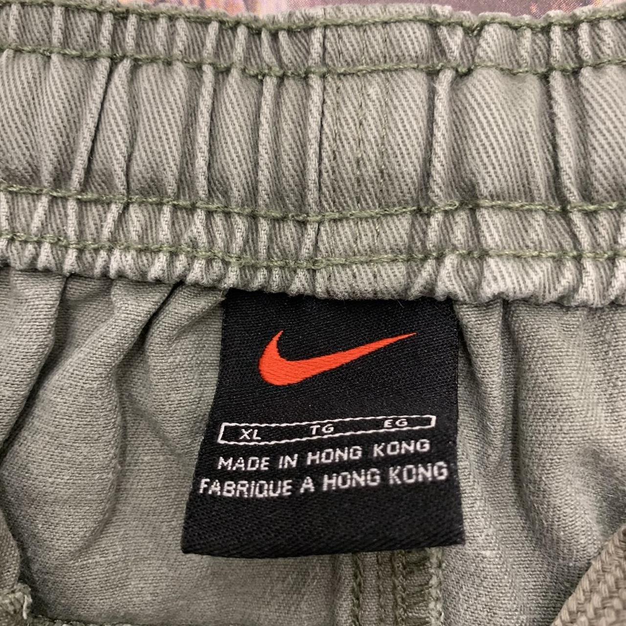 Vintage Nike cargo shorts in green. From 2000. Mens... - Depop