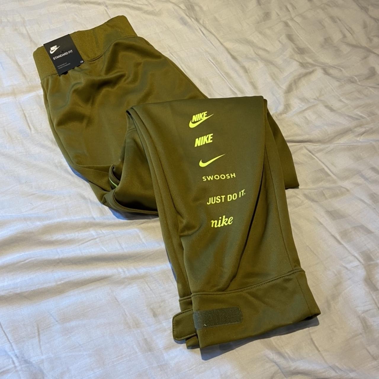 olive green nike track pants