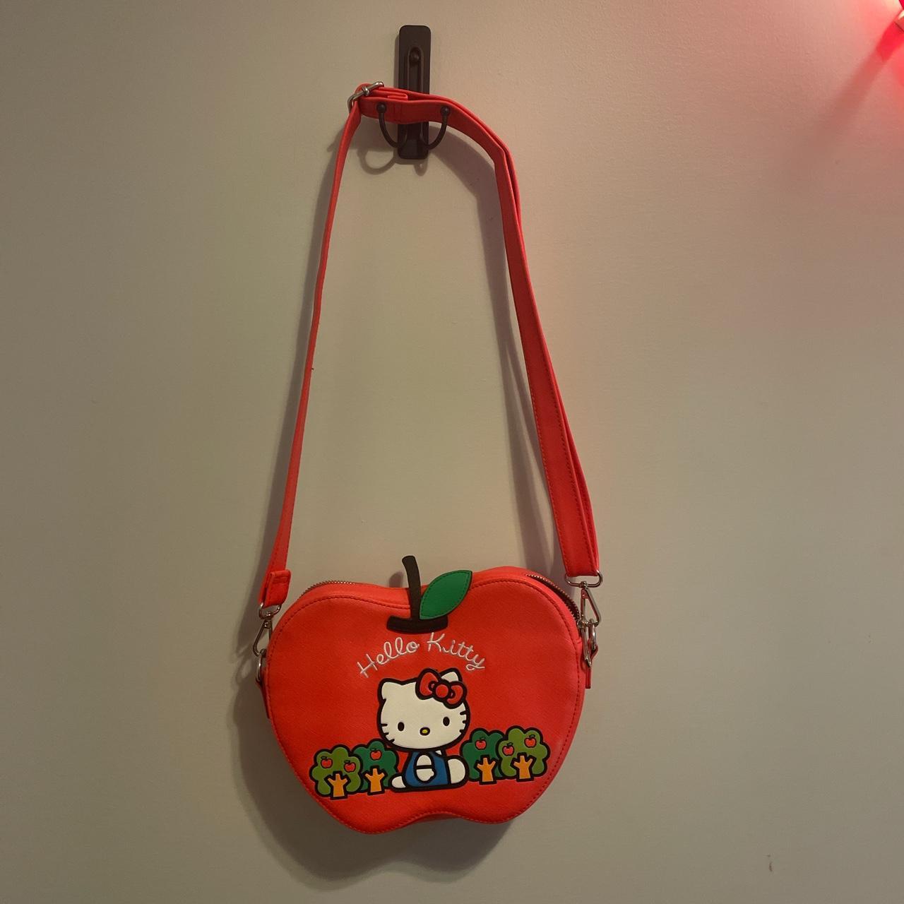 Super cute NWT Hello Kitty (Loungefly) Apple shaped...