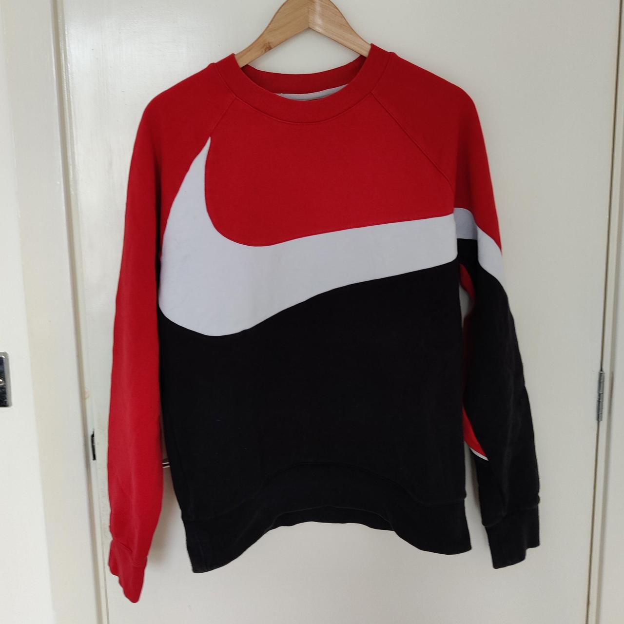 black nike sweatshirt with red tick