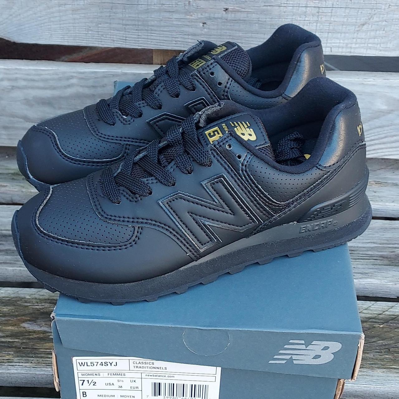 womens new balance black & gold 574 trainers