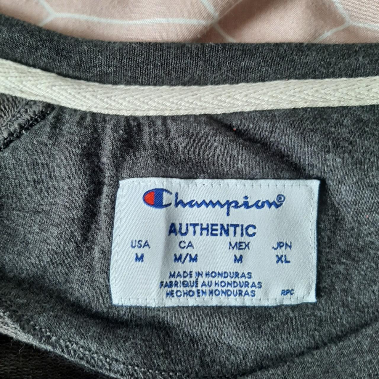 Grey Champion sweatshirt. Small logo on sleeve.... - Depop