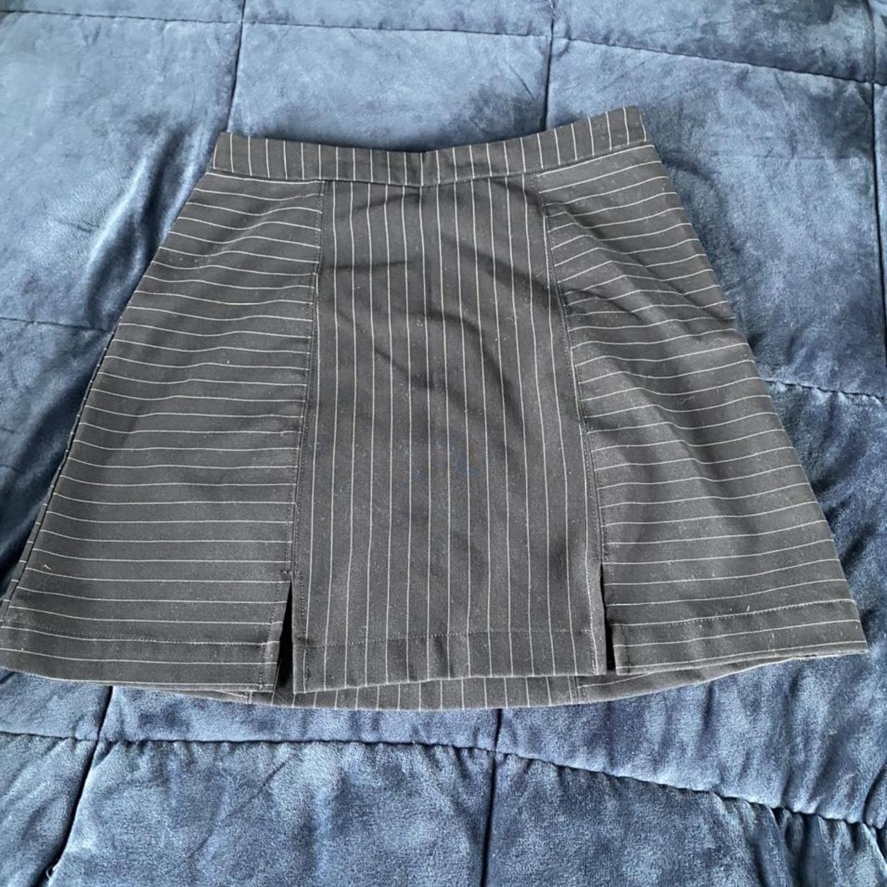 mini skirt with slits sized xs but it could also... - Depop