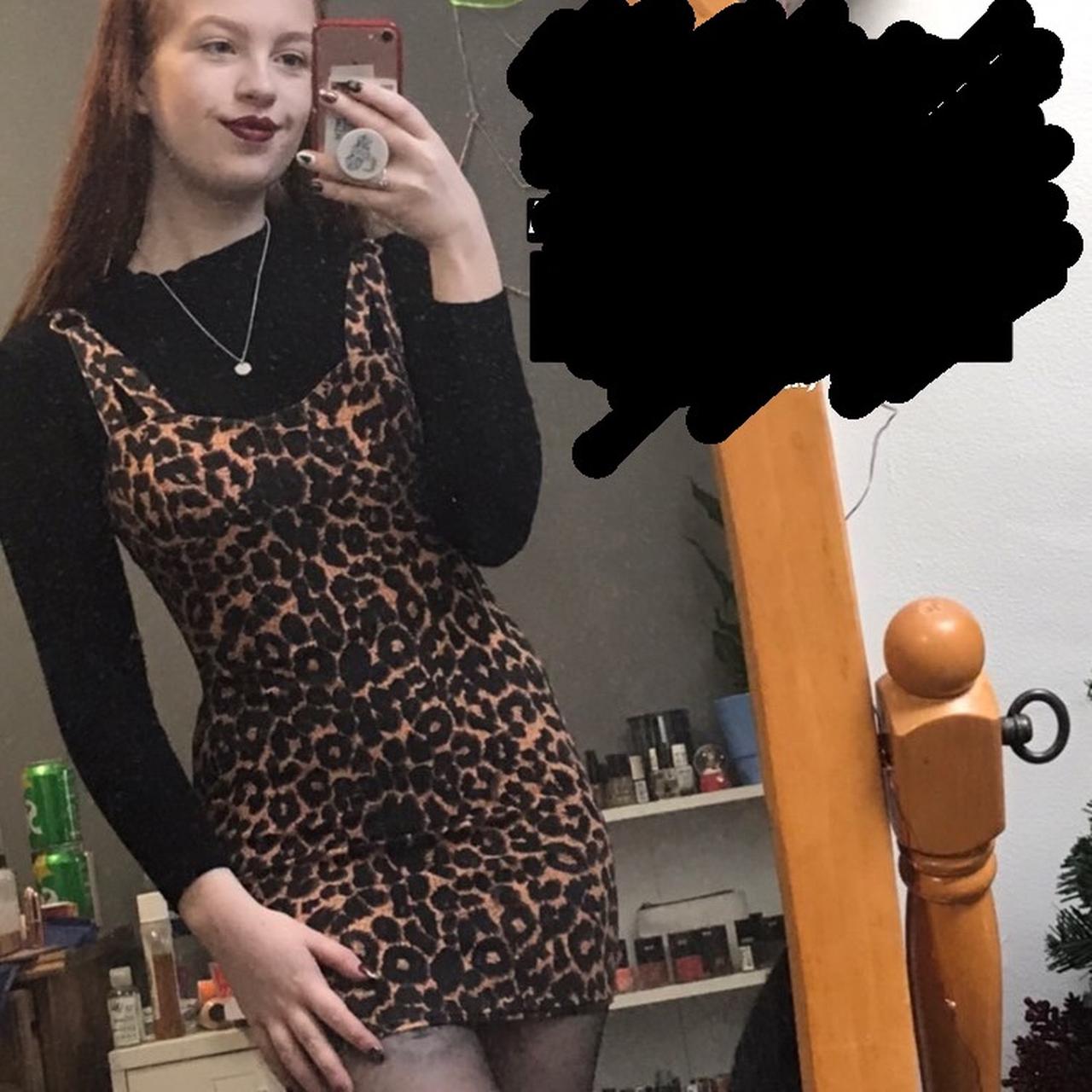 Leopard print dress store with black top underneath