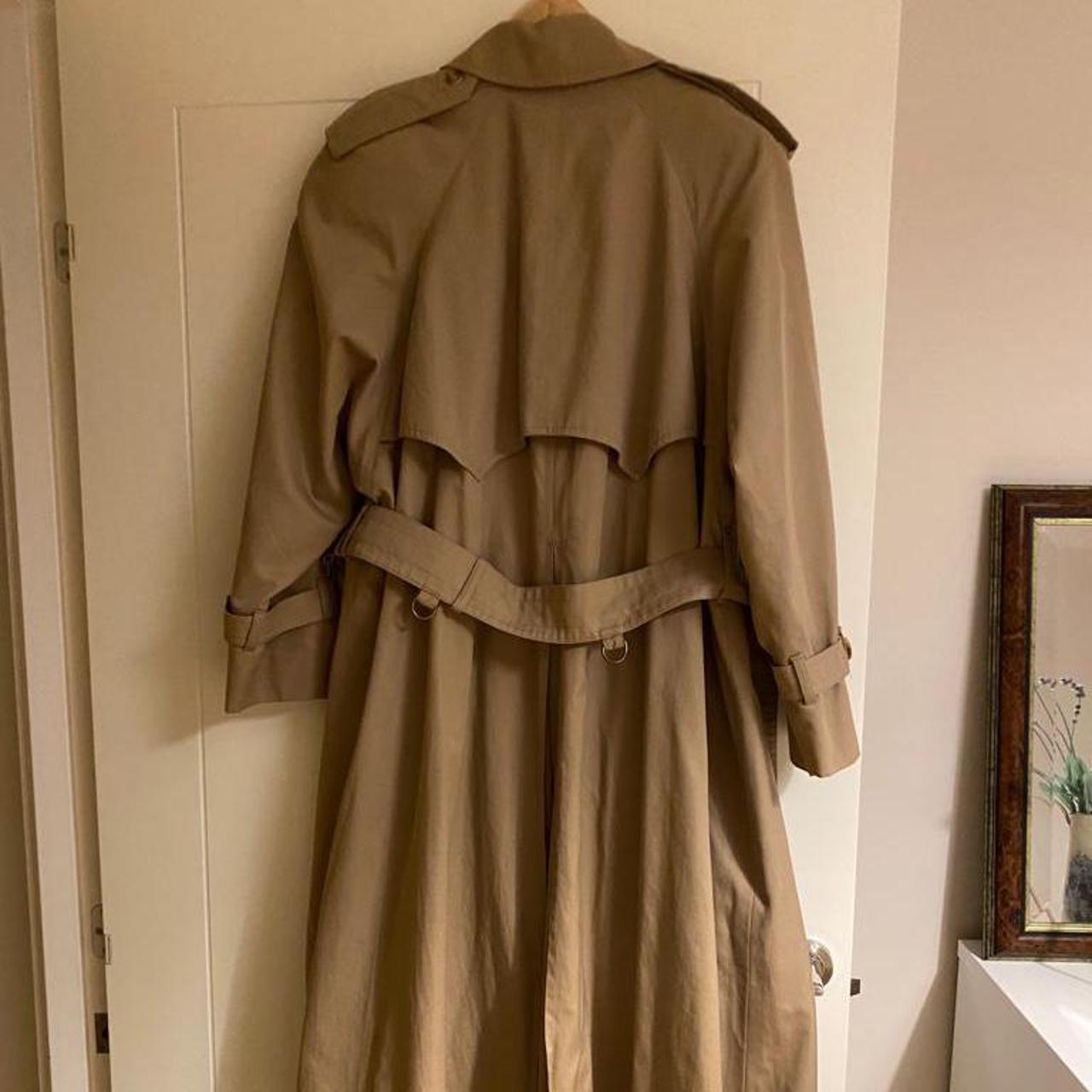 Vintage 1980s Aquascutum trench coat. Wearer is size