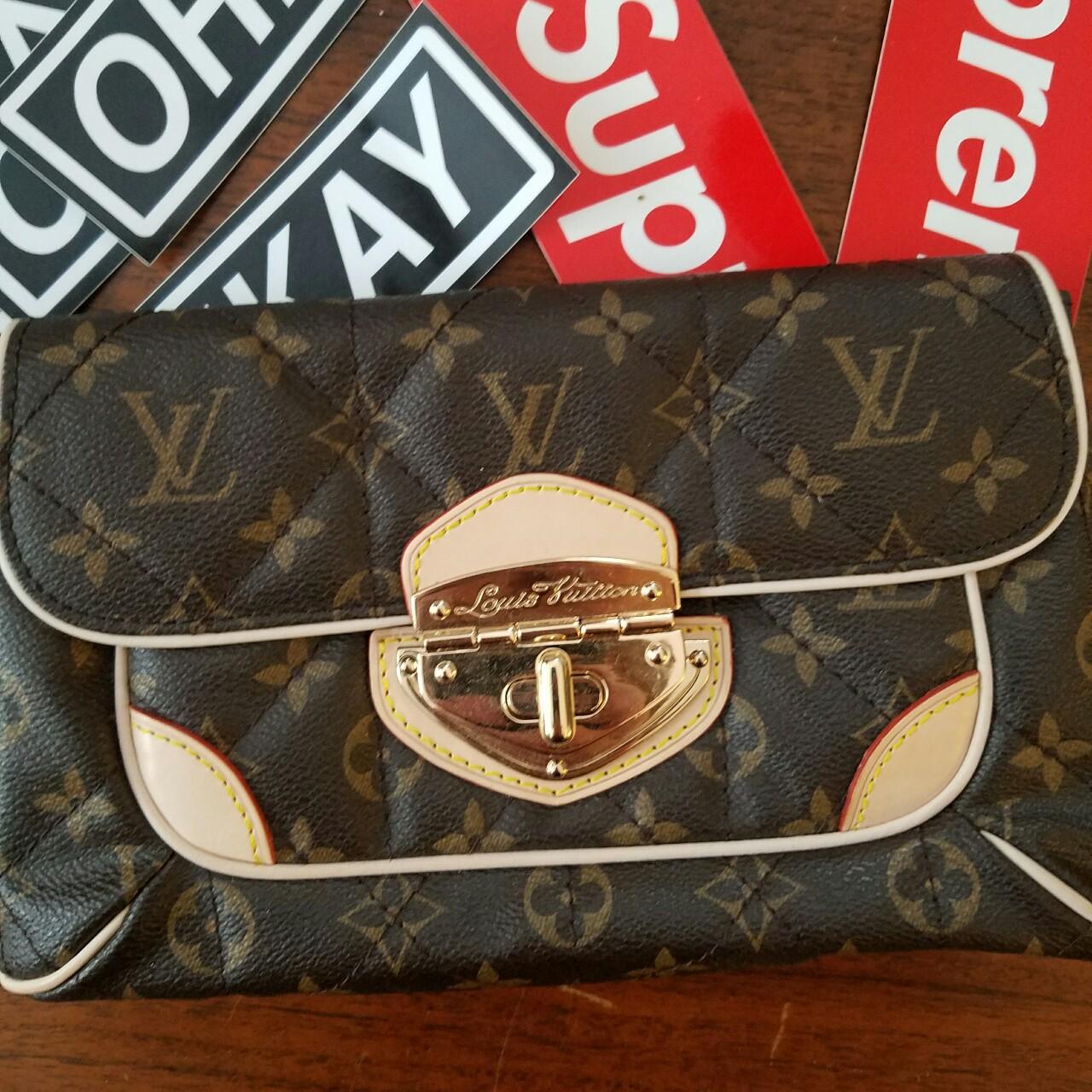 Loui Vuitton monogram Etoile quilted clutch