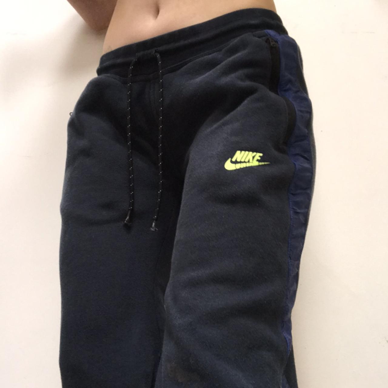 Low waist Nike joggers. Navy with neon logo. 7/10 - Depop
