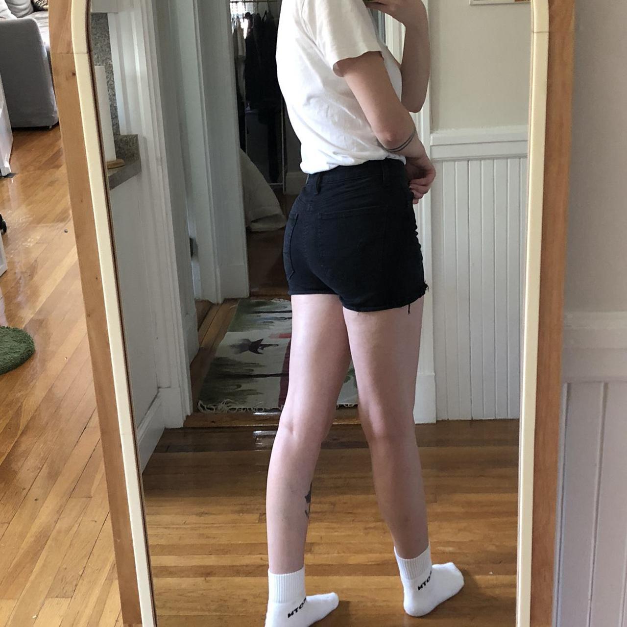 american eagle high rise black denim shorts. size 2... Depop