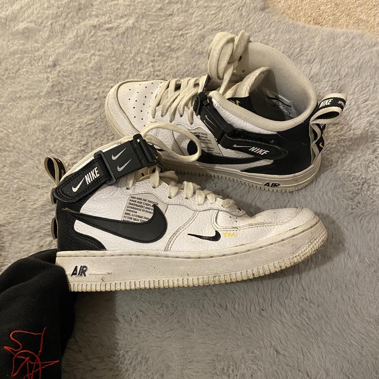 nike high top shoes black and white