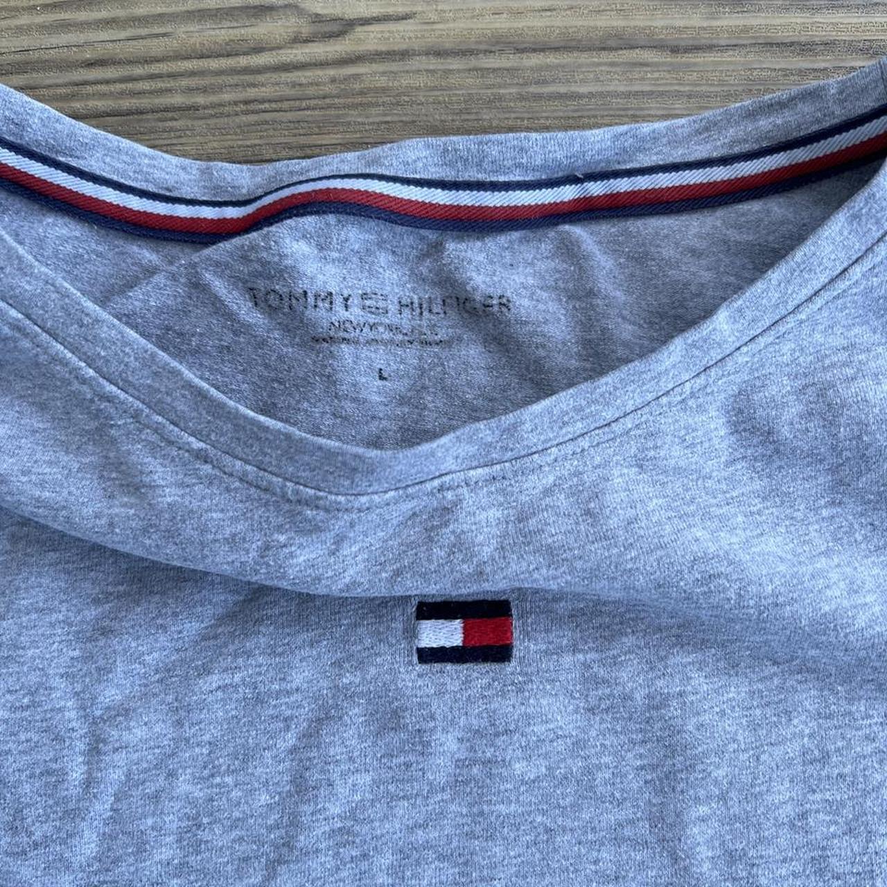 large Tommy Hilfiger top. good condition, faded... - Depop