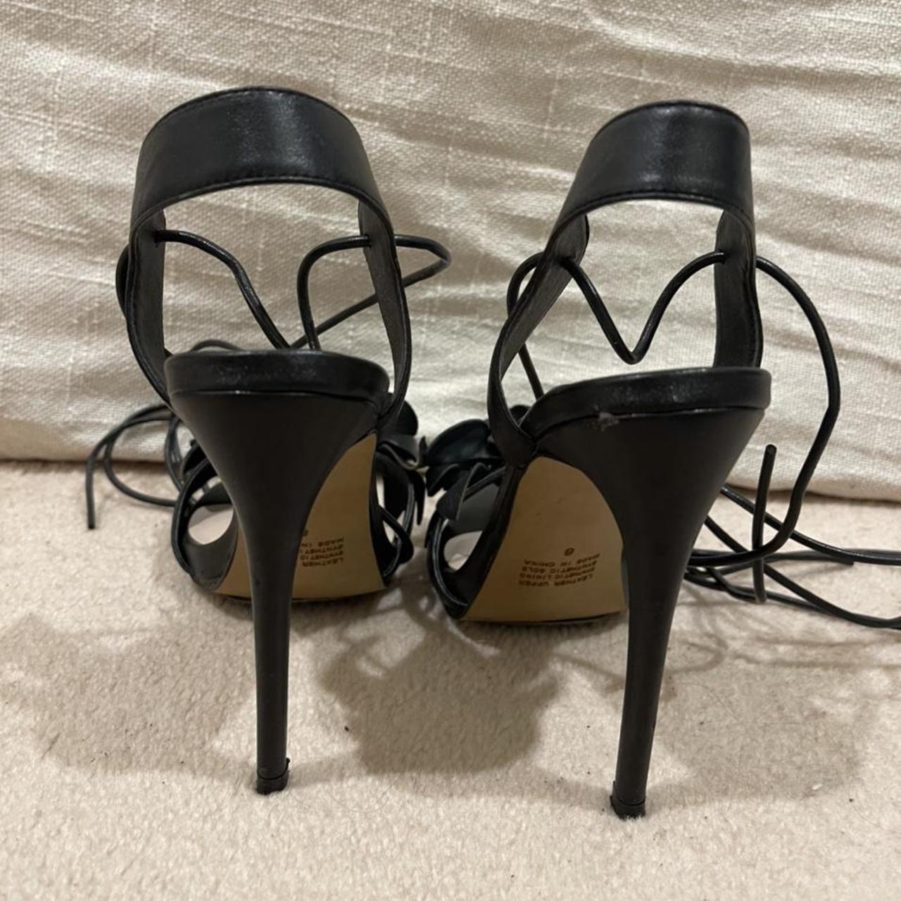 strappy black siren heels with flower details, worn... - Depop