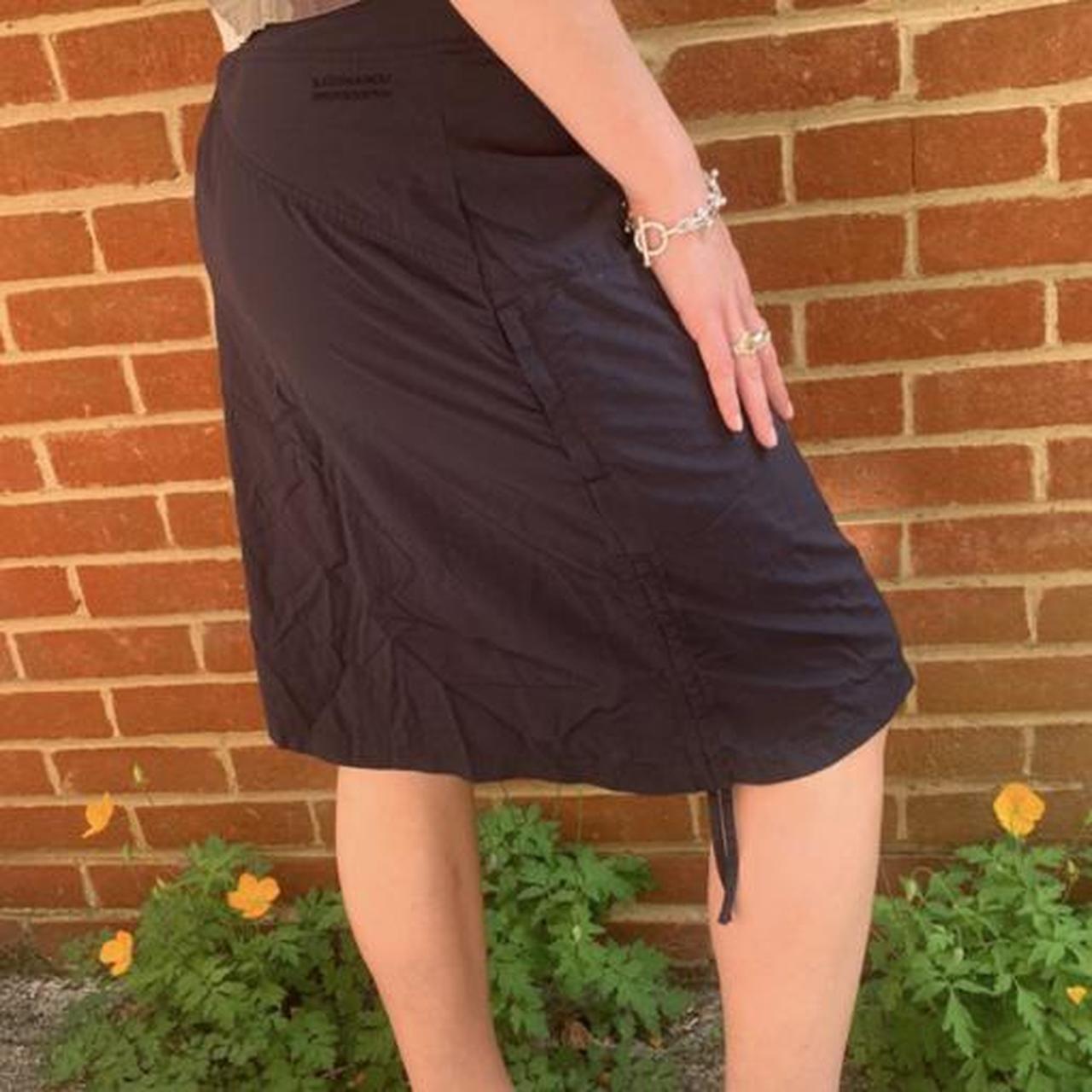 Coolest midi length cargo skirt with drawstrings on... Depop