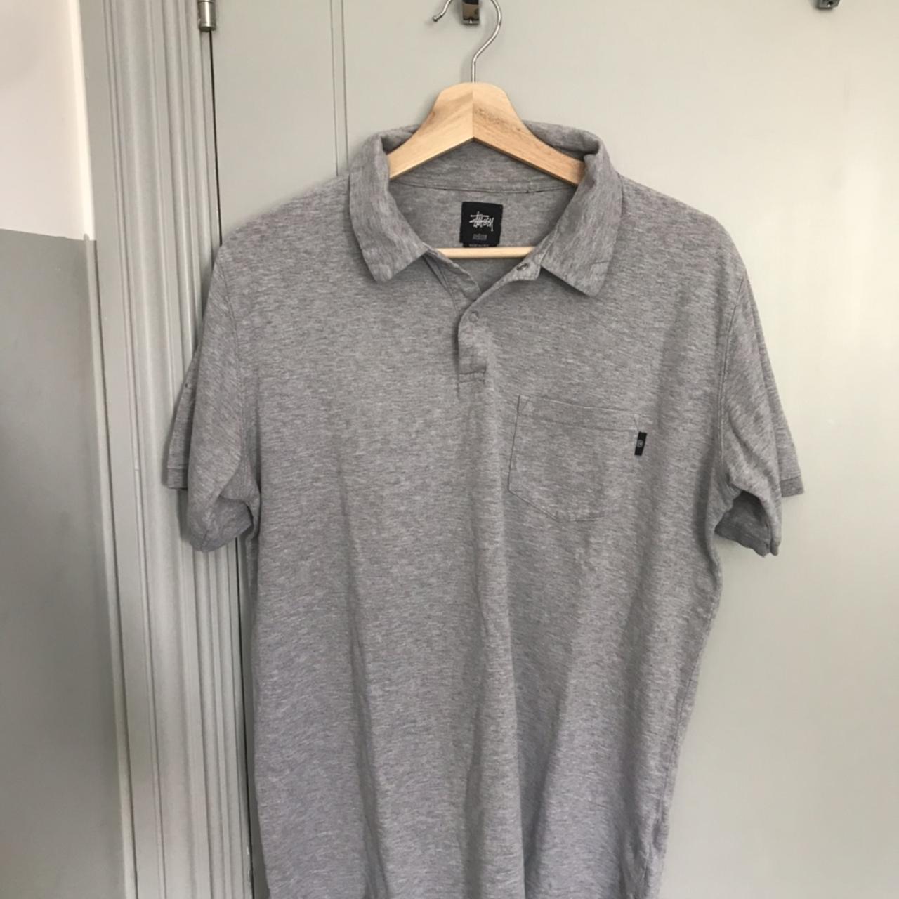 Stussy grey polo shirt. Tag says medium but fits... - Depop