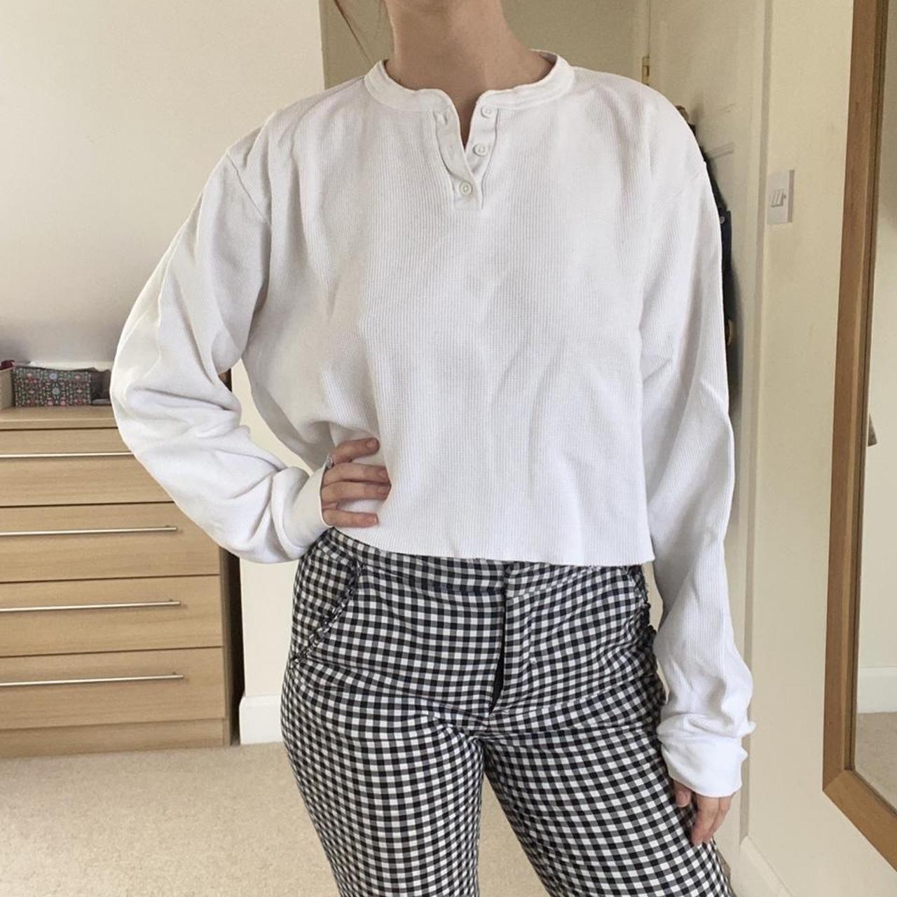 Brandy Melville white long sleeve top with collar.... Depop