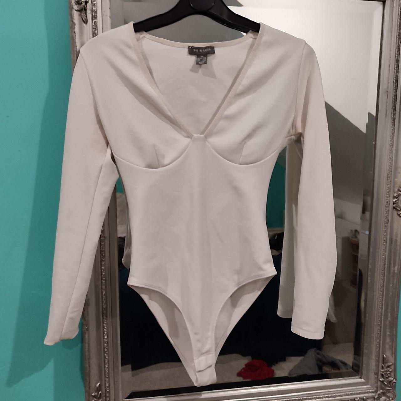 white bodysuit, long sleeved, size XS would fit... - Depop