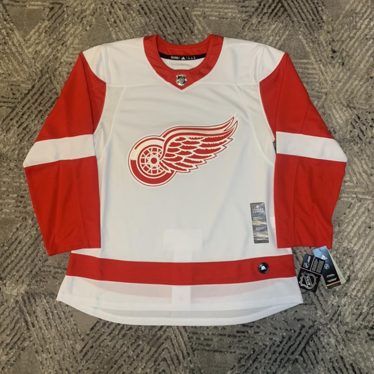 Mavin  NWT Detroit Red Wings Authentic Home Red Practice Hockey Jersey  Adidas 56 CA7196