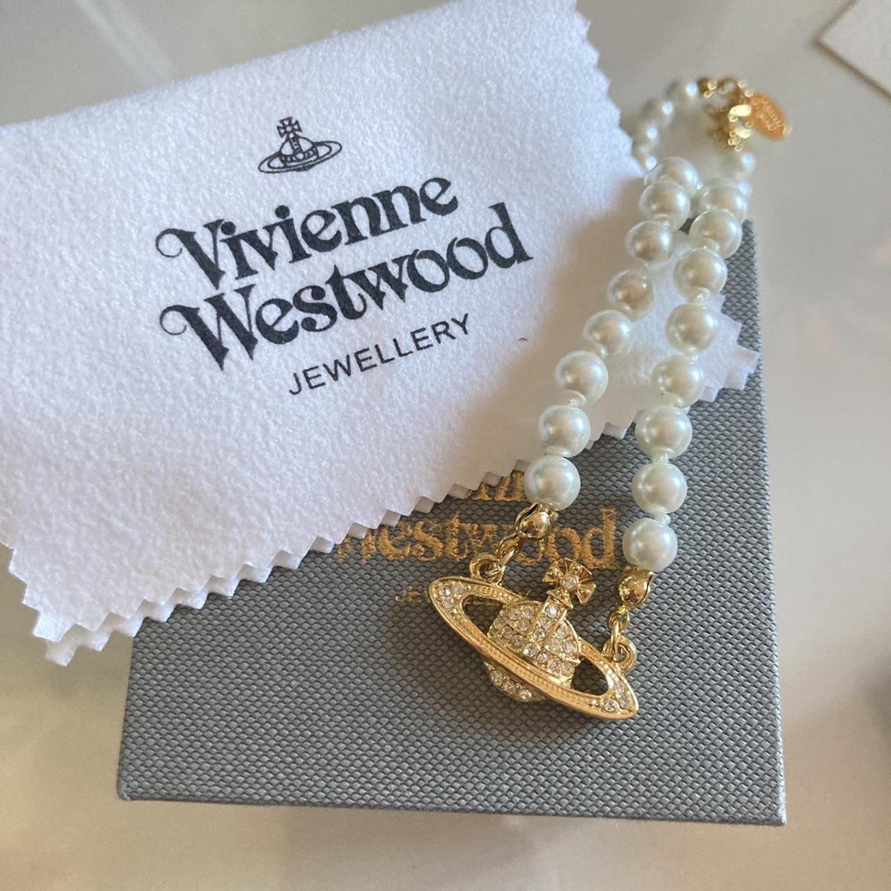 Vivienne Westwood Gold Orb Pendant peal necklace... - Depop