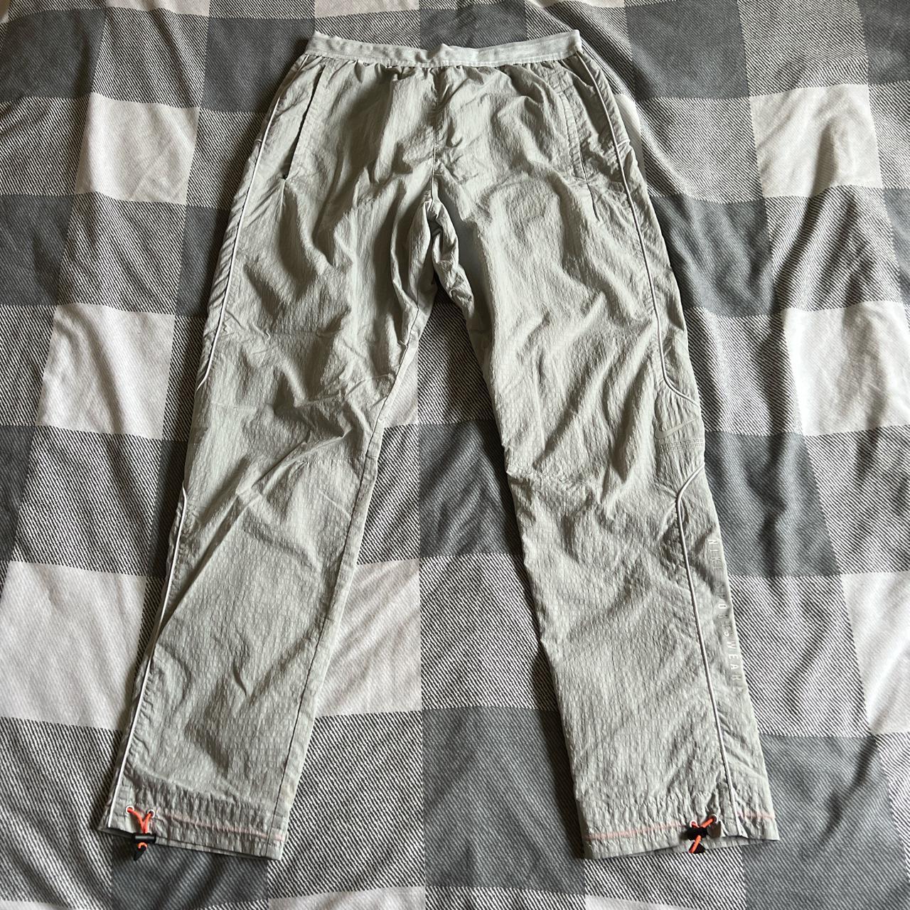 nike shell suit bottoms