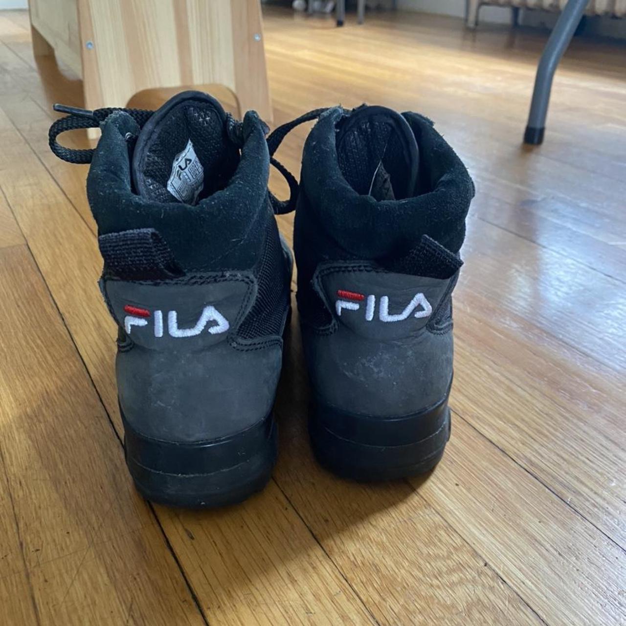 Black FILA combat boots. Super comfy. Tagged EUR... - Depop