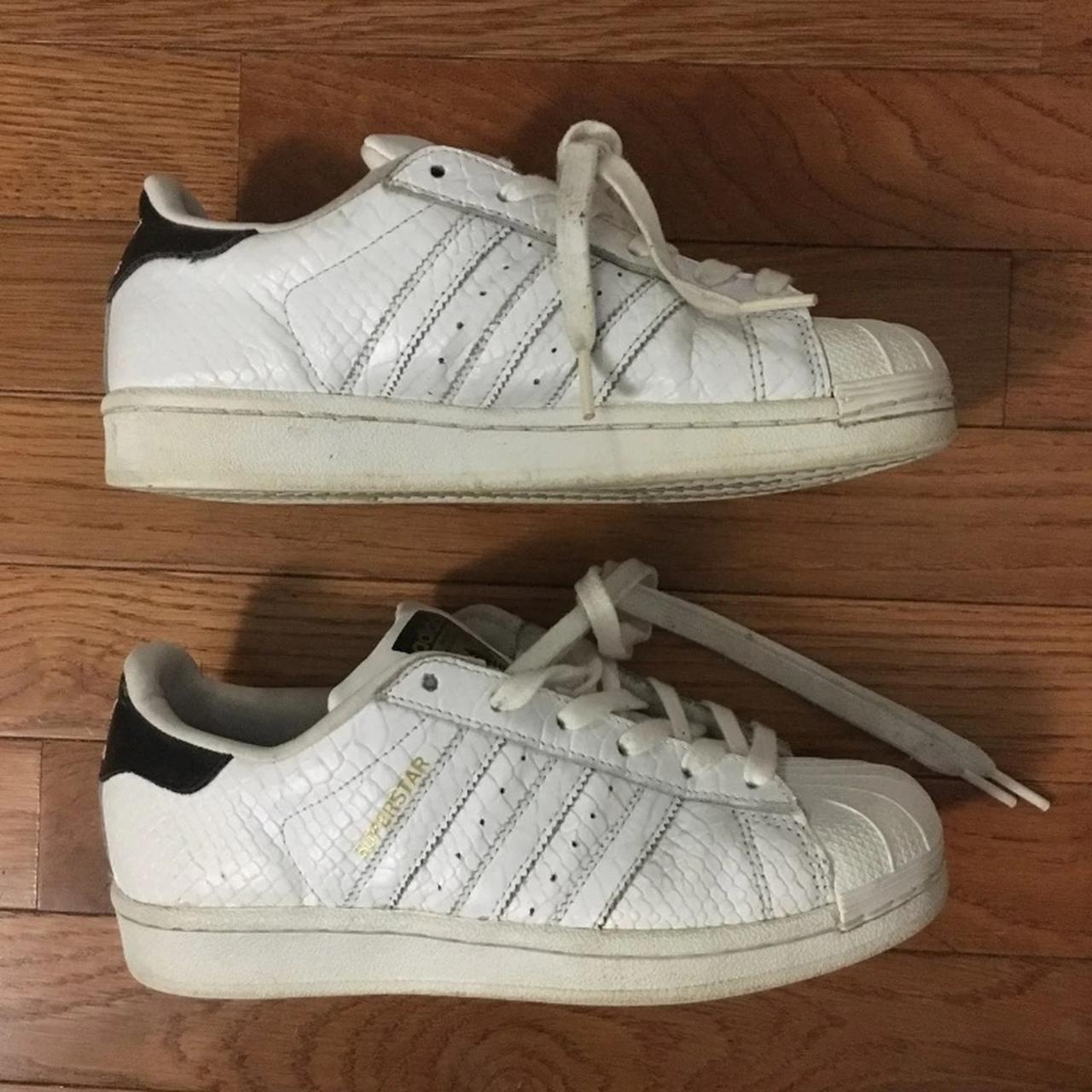 White adidas all stars🌟 Scuff on the right shoe by... Depop
