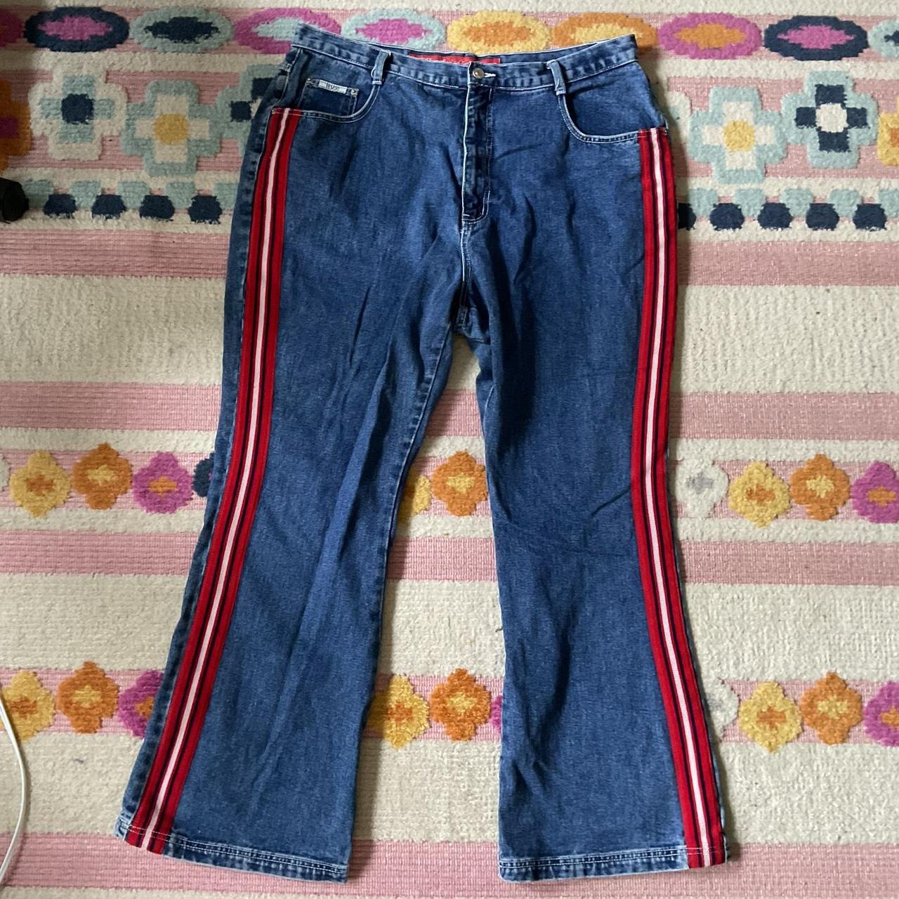 Incredible flared jeans with stripes down the sides... - Depop