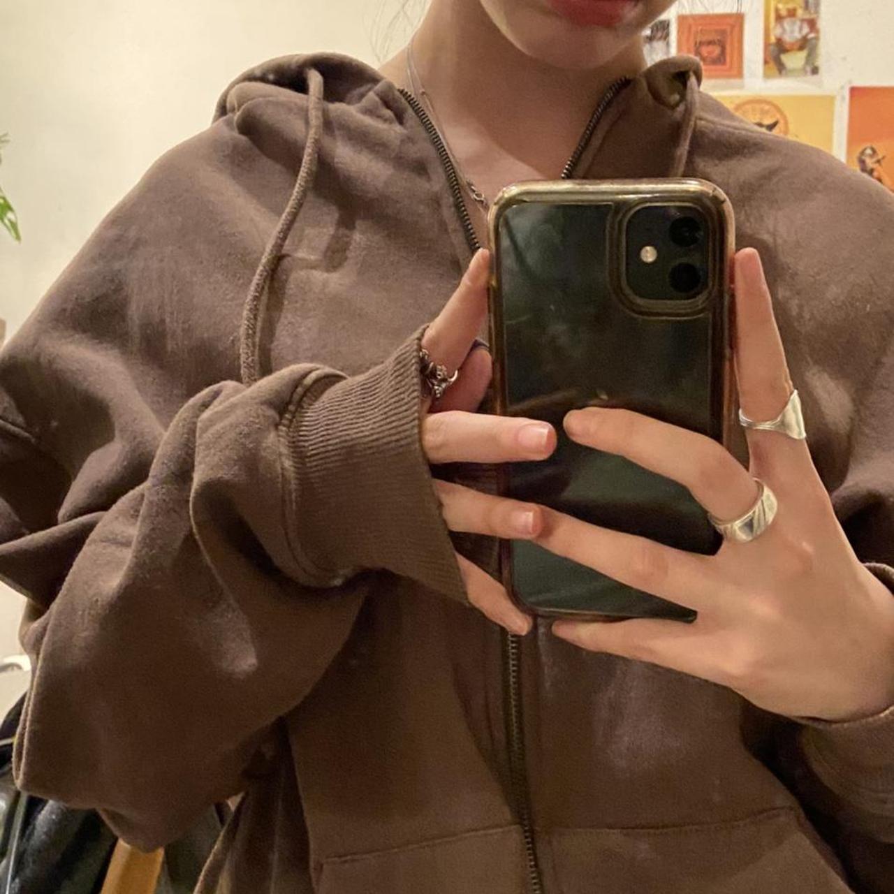 subdued brown zip up