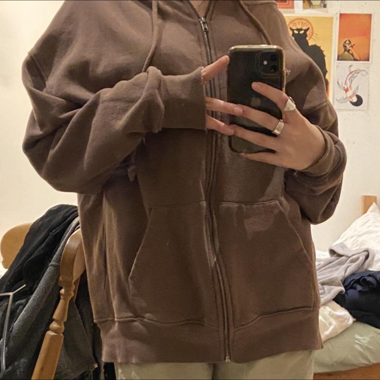 subdued brown zip up