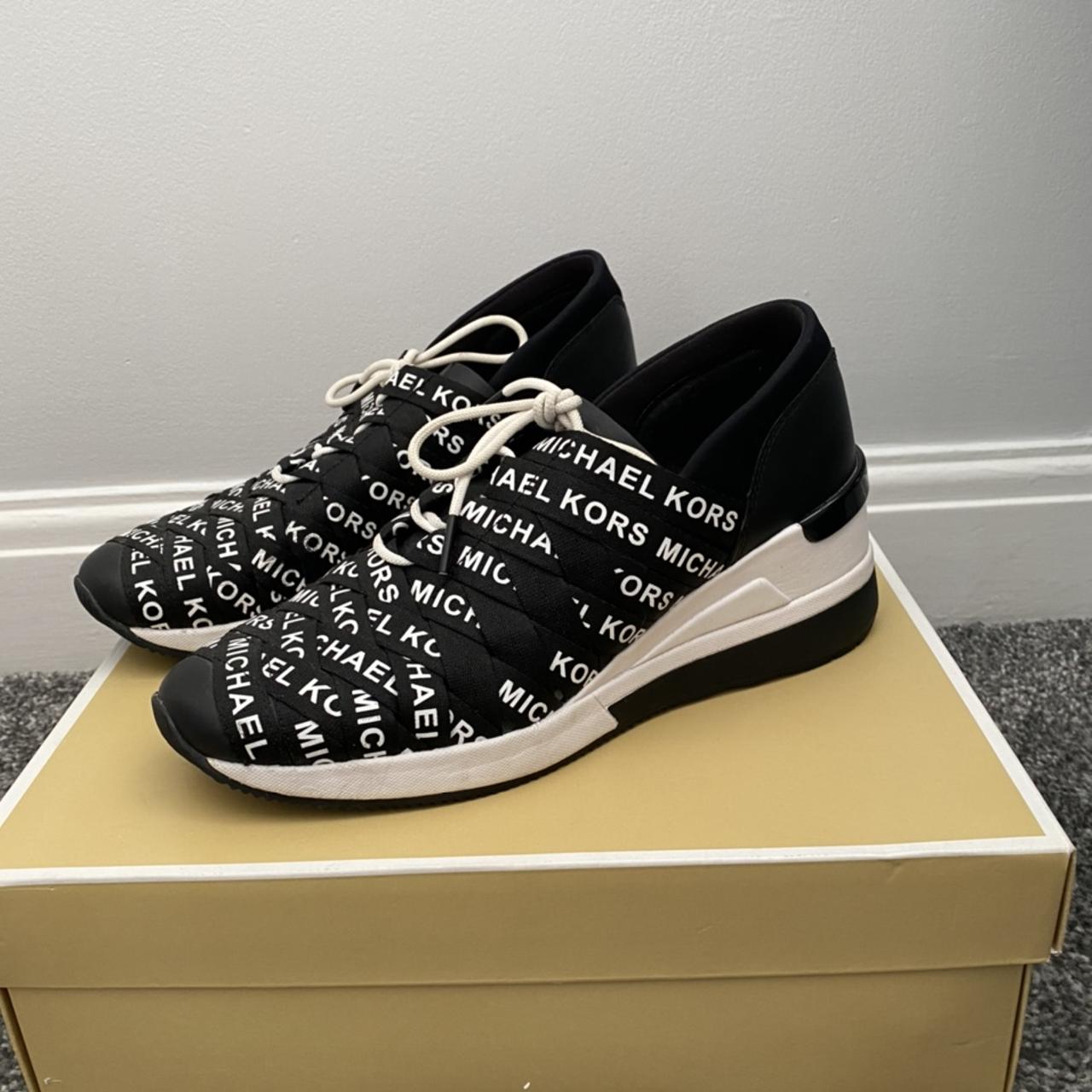 Michael kors hot sale cydney trainer sneakers