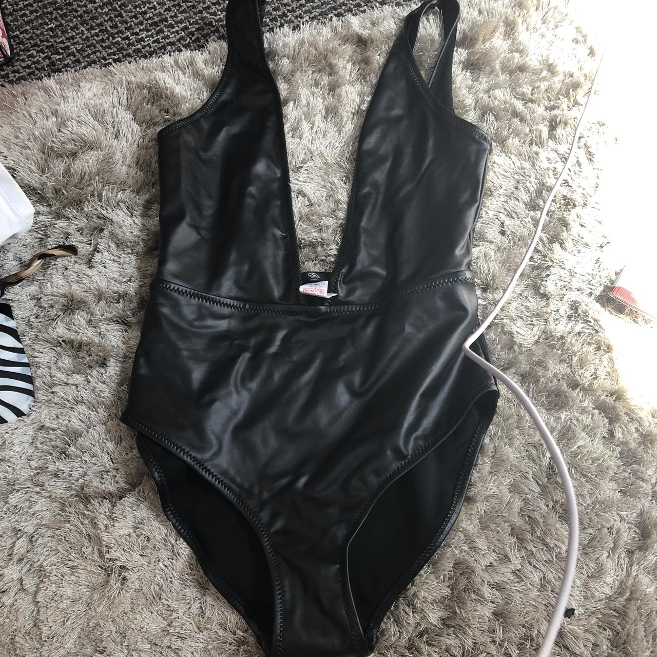Black leather look low cut swim suit. Never worn... Depop