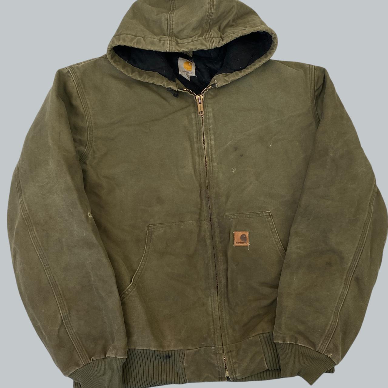 green vintage carhartt jacket