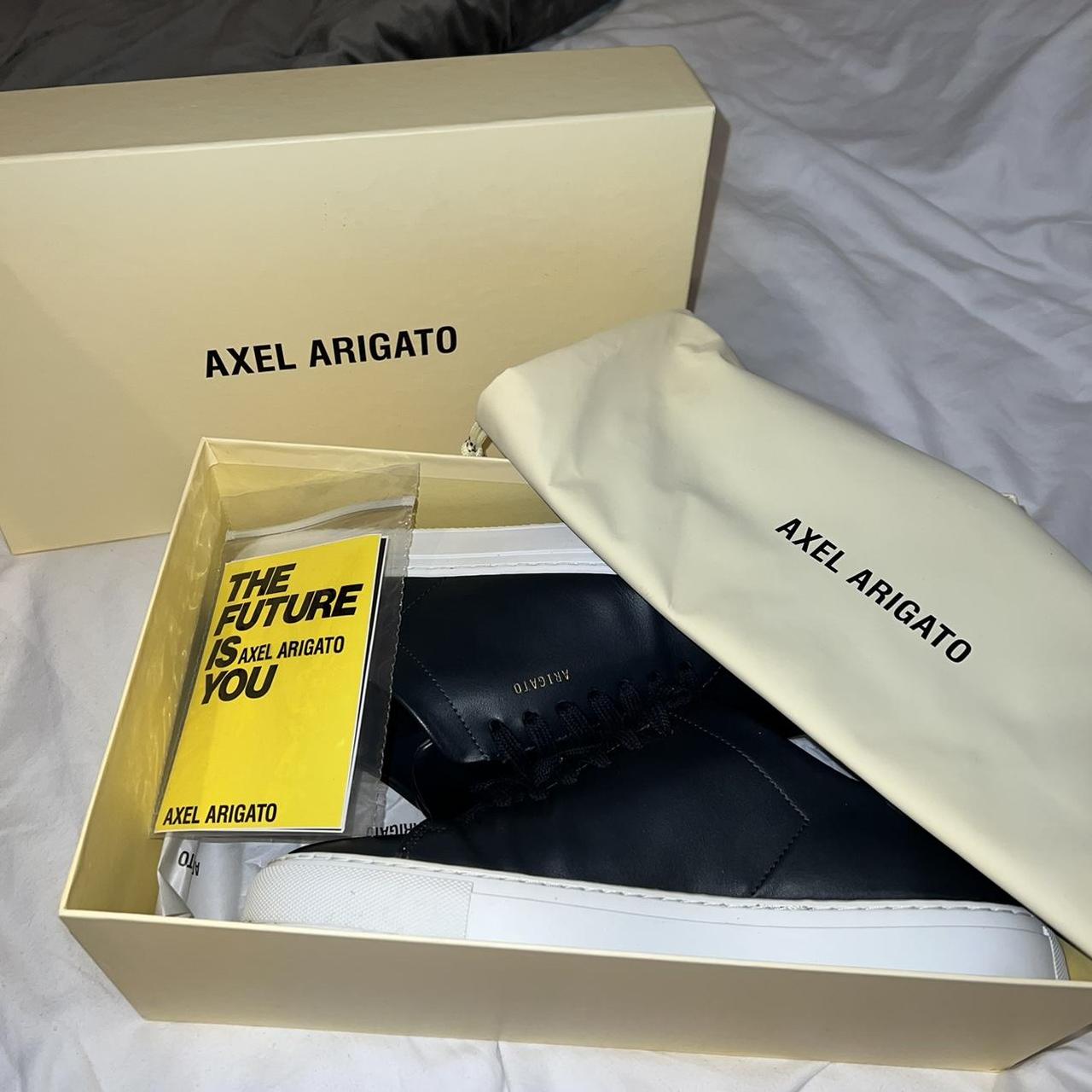 Navy axel arigato leather worn twice not sold... Depop