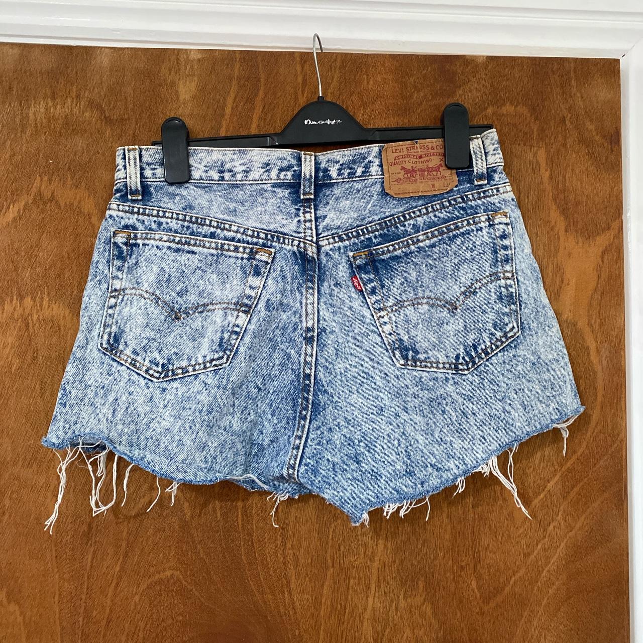 Vintage Levi’s shorts in blue acid wash.... Depop