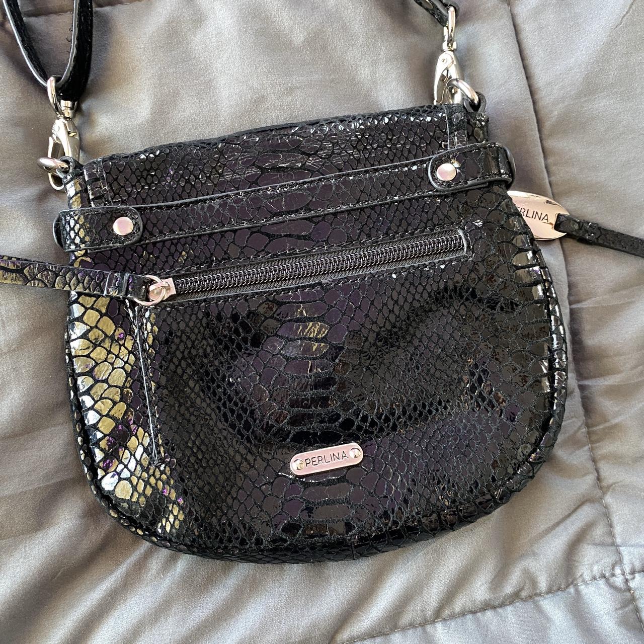 small black purse with pink silk lining. strap is... - Depop