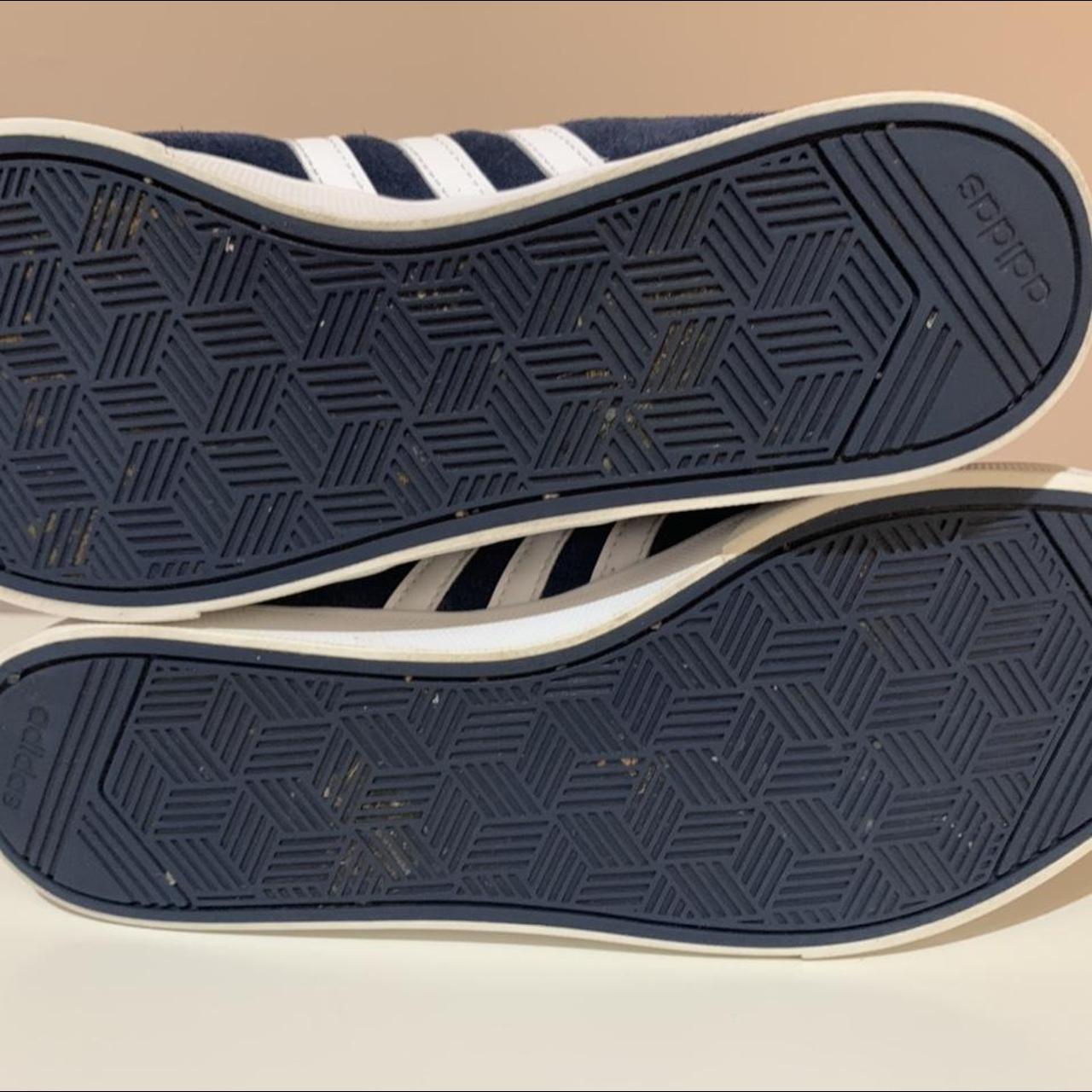 Navy adidas trainers. Wear and tear shown. Can be... Depop