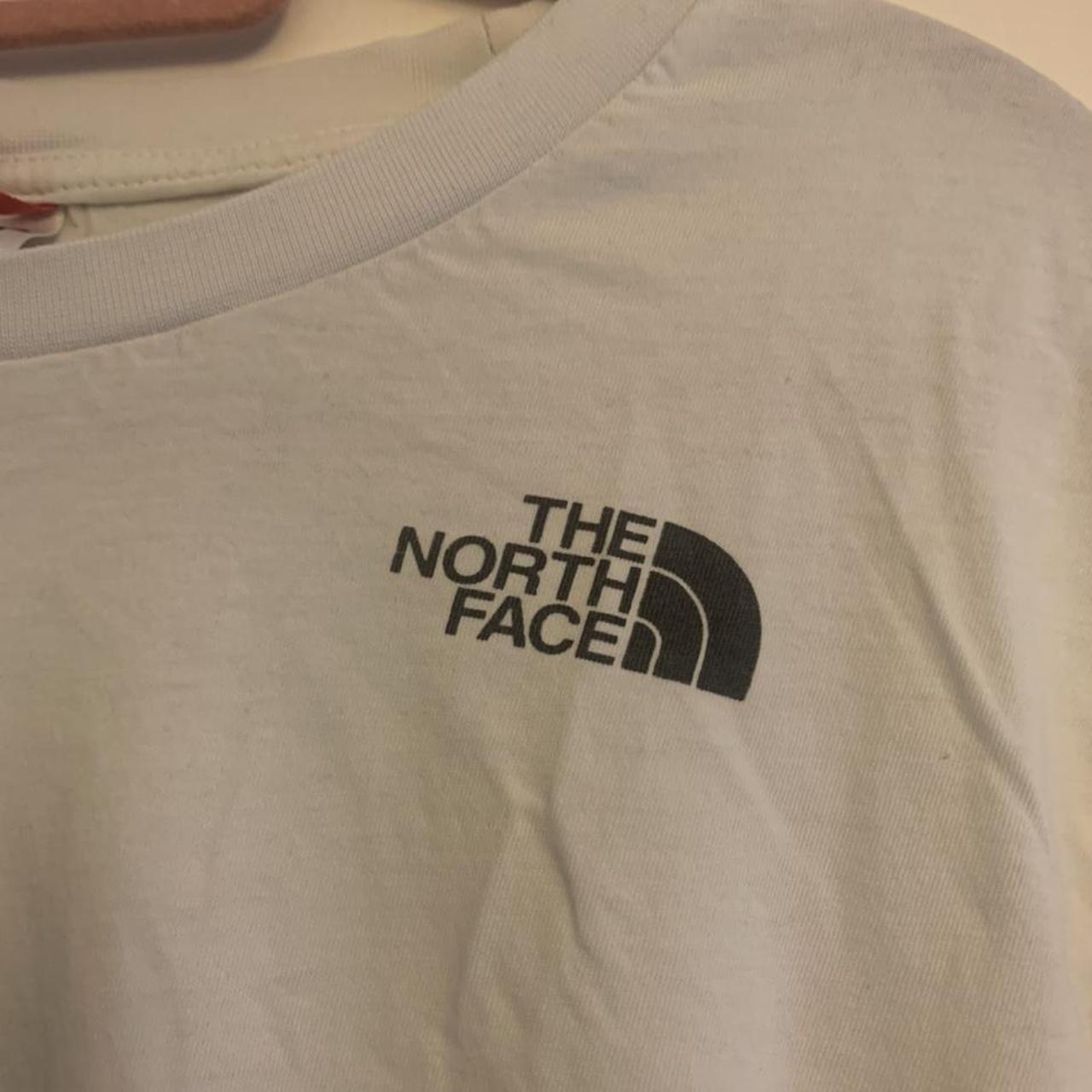 Small North face white t-shirt worn a number of... - Depop