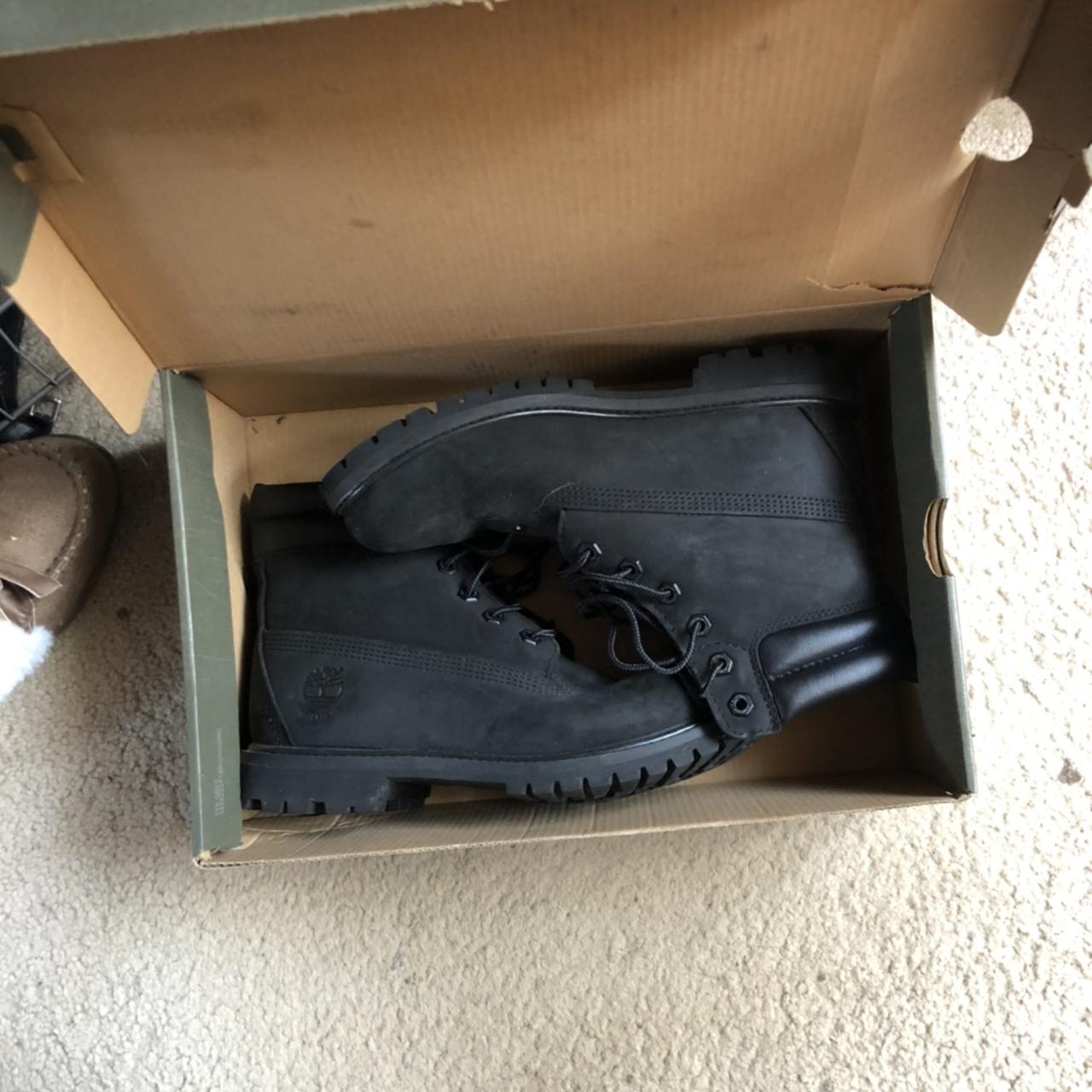 all black timberland boots minor creasing on the... - Depop