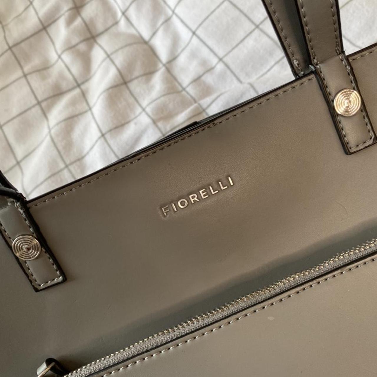 Large Leather fiorelli bag, fits lots in few minor... Depop