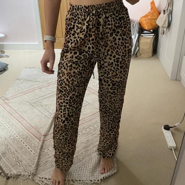 Topshop Leopard print satin trousers with red. Depop