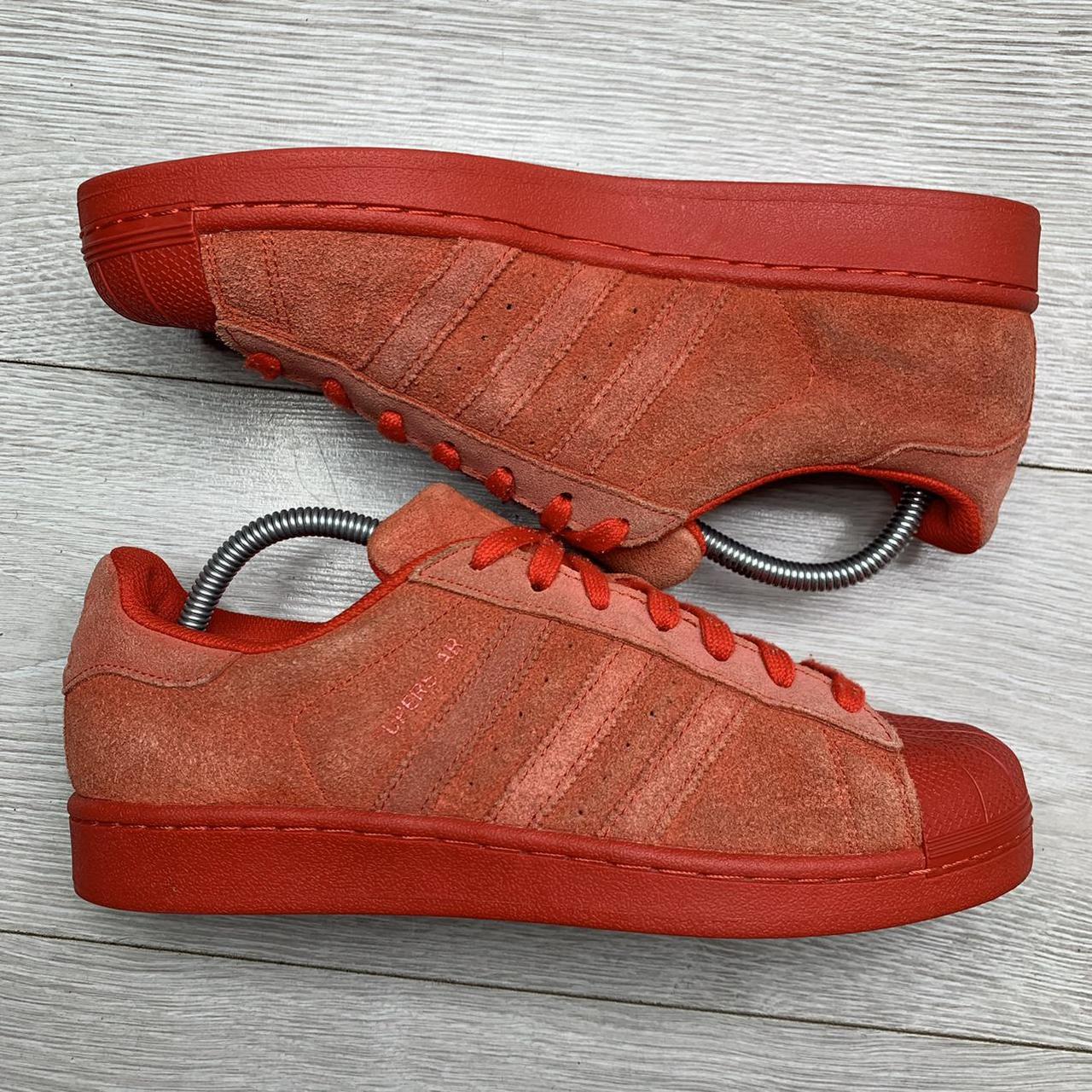 red suede shell toe adidas