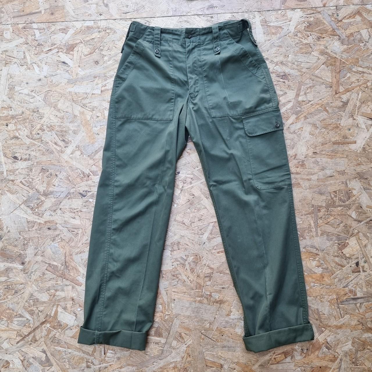 Vintage army cargo trousers in military green... - Depop