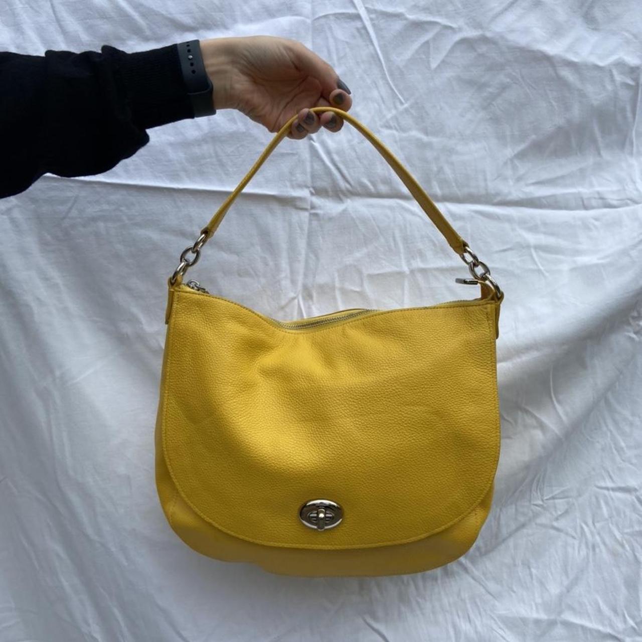 Coach Turnlock Hobo Signature bag introduced in. Depop