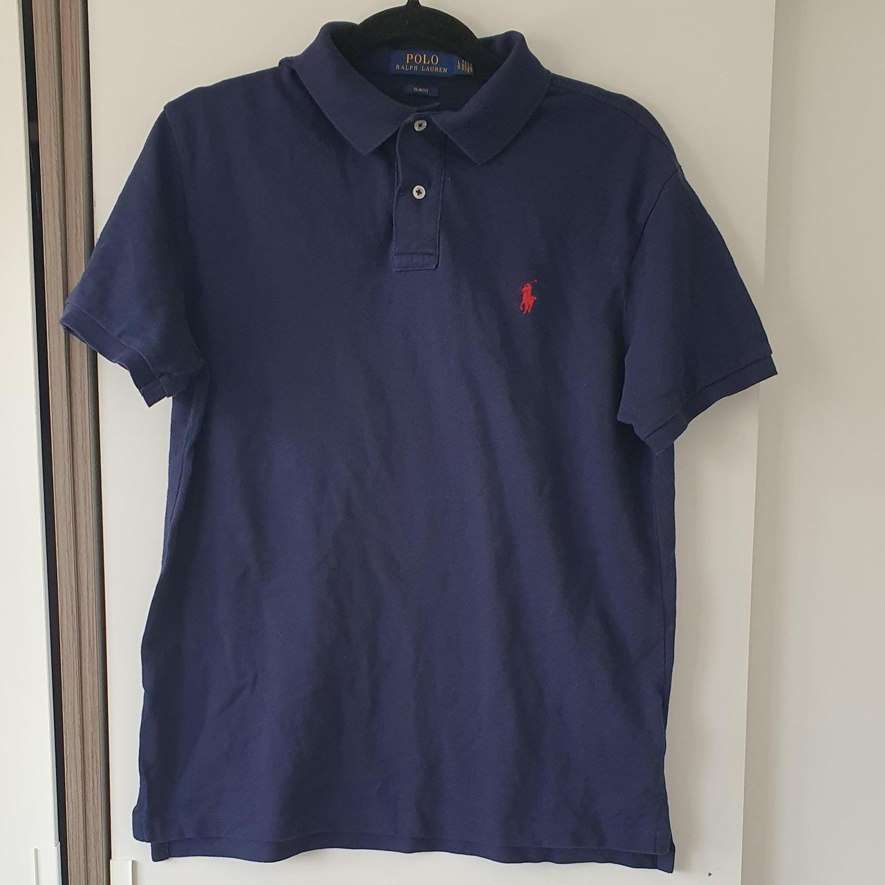 Navy blue Ralph Lauren top with red logo. Size... - Depop