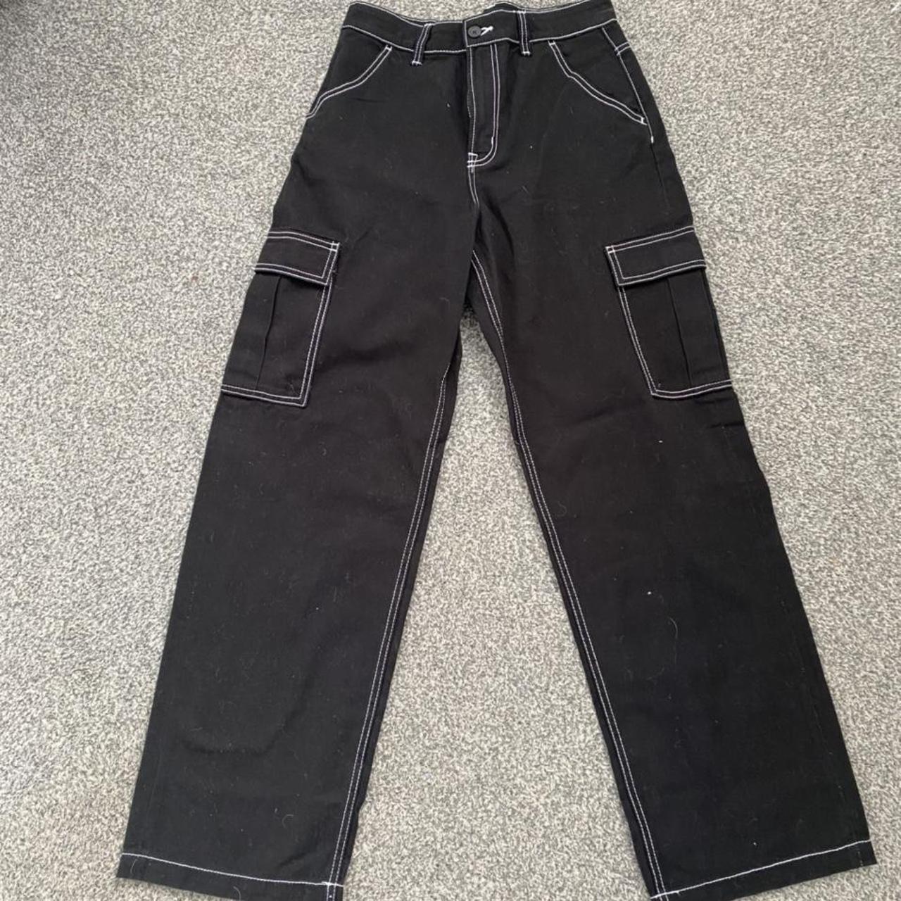 High waisted black cargos with white contrast... - Depop